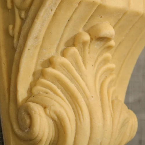 Sandstone Scroll Bracket with fluted body and shell carving