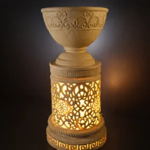 Sandstone Planter Light Stand with carved bowl and glowing lattice base