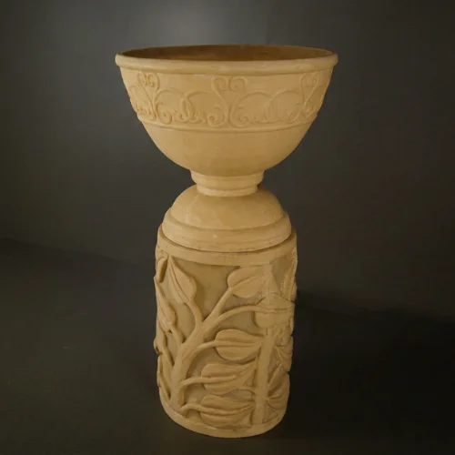 Sandstone Leaf Planter Light with glowing carved leaf pattern base