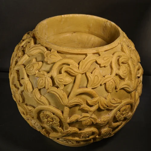 Sandstone Round Vine Planter with glowing carved floral pattern