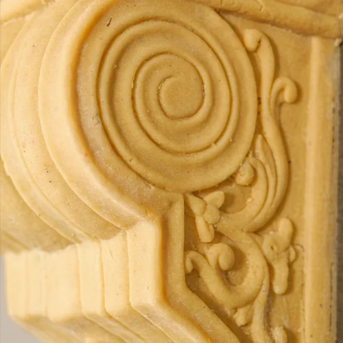 Sandstone Scroll Bracket with fluted body and shell carving
