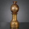 Golden Orb Pedestal Lamp with glowing sphere on antique base