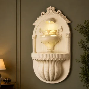 Sandstone Wall Fountain with carved arch niche and warm glow