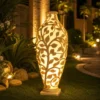 Sandstone Tree Vase Garden Light with glowing carved tree design