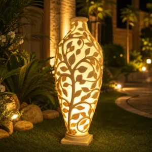 Sandstone Tree Vase Garden Light with glowing carved tree design