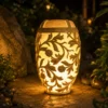 Illuminated sandstone planter and pot with floral carved design and fiberglass light section