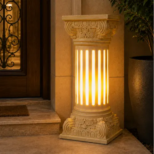 Add a graceful silhouette to your outdoor space with our sandstone garden light, a flared vase design finished with an elegant vine-carved body. Built to withstand the elements while adding timeless charm, this piece suits gardens, patios, walkways, and entryways beautifully. Flared Top Design Skilled artisans shape the crown of this sandstone garden light into a wide, gentle flare, inspired by classic vase silhouettes. The open, flowing top contrasts beautifully with the detailed carving below, giving the piece a graceful, balanced profile that draws the eye from a distance. Vine-Carved Column Body Flowing vines and delicate floral patterns wrap the cylindrical body of this sandstone garden light. Every leaf and petal is carved by hand, and once switched on, warm light glows softly through the detailed cutwork. The continuous vine pattern wraps around the column, creating a natural, garden-inspired look that reads beautifully by day and glows warmly by night. Glowing Fiber Illumination Inside the stone shell, a durable fiber lining delivers soft, even illumination. The fiber glows warmly through every carved detail, casting a gentle light across the surrounding space after sunset — perfect for creating a relaxed, welcoming outdoor atmosphere. Durable & Weather-Resistant Build Crafted from premium natural sandstone, this garden light is made to handle outdoor conditions year-round: - Washable — simply rinse with water to keep it looking fresh - Weatherproof — resists rain, sun, and seasonal wear - Sturdy construction — a tiered base keeps it stable outdoors - Low maintenance — no repainting or protective coating required With its flared vase top, hand-carved vine detailing, and warm glowing light, this sandstone garden light is a lasting addition to any outdoor setting.