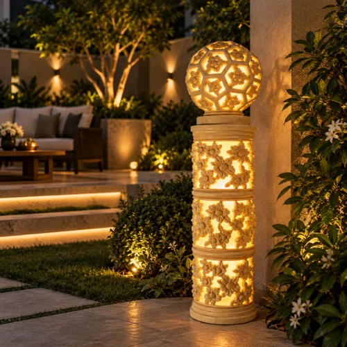 Sandstone Garden Pillar Light with carved floral pattern and glowing ball top