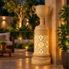 Sandstone pedestal lamp with glowing fiber glass center