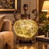 Ornate fiber glass table lamp with curved decorative handles