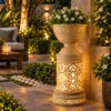 Sandstone Planter Light Stand with carved bowl and glowing lattice base
