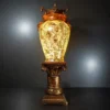 Golden Orb Pedestal Lamp with glowing sphere and antique gold base