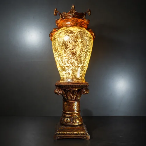 Golden Orb Pedestal Lamp with glowing sphere and antique gold base