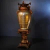 Golden Orb Pedestal Lamp with glowing sphere and antique gold base