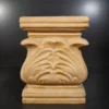 Sandstone carved leaf pedestal with scalloped urn top and stepped square base