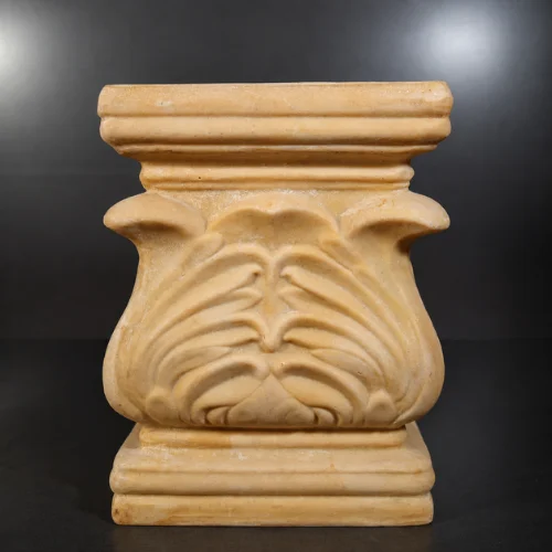 Sandstone carved leaf pedestal with scalloped urn top and stepped square base
