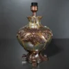 Floral fiber glass table lamp with glowing decorative body