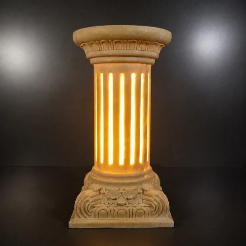 Sandstone fluted column garden light glowing warmly on a dark background