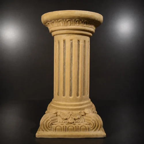 Sandstone fluted column garden light glowing warmly on a dark background