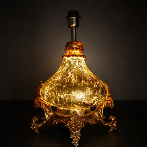 Ornate fiber glass hanging lamp with glowing decorative shade