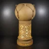 Sandstone glowing pedestal light with fiber glass center