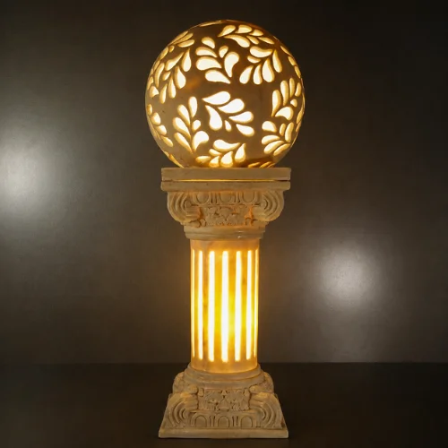 Sandstone garden pillar light with floral carved glowing sphere
