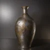 Ornate fiber glass table lamp with textured vase design